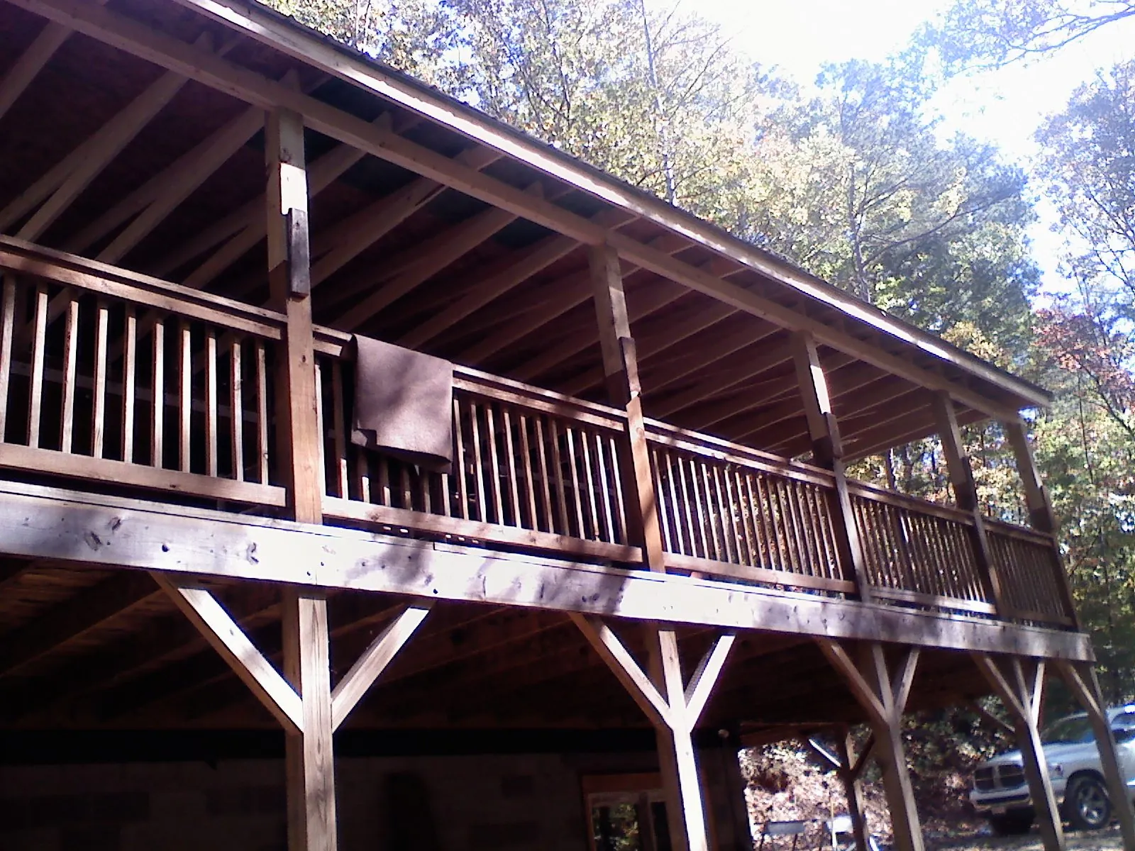Timber framing under a new elevated porch and deck — Roof Leak Repair in Prattville by Roofing Brothers